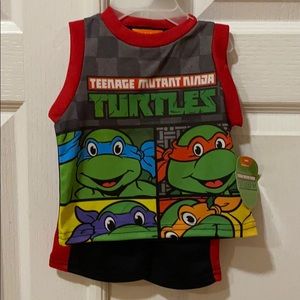 New with tags. 2 piece shirt and shorts set.